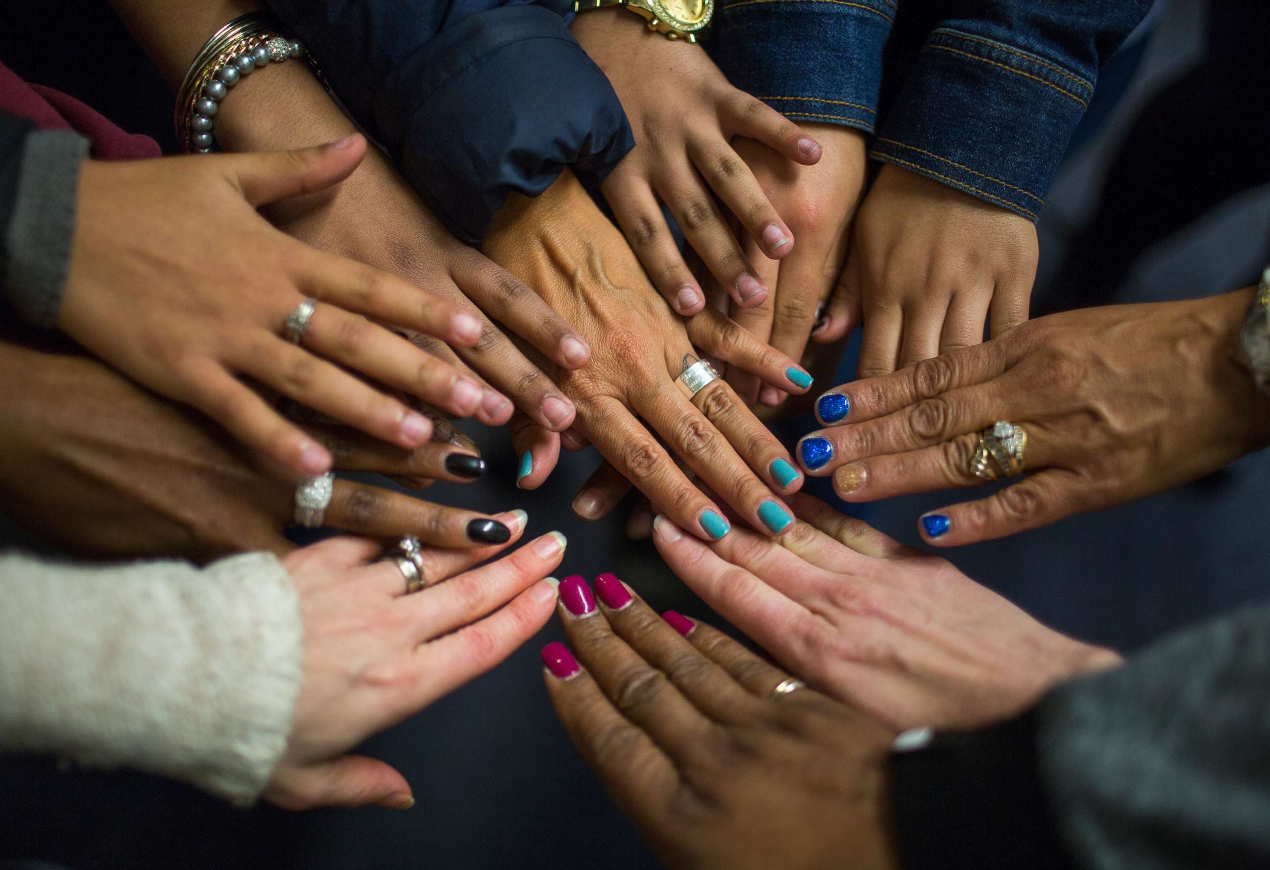 PHOTO: In a show of solidarity, unidentified victim of sex trafficking put their hands together during a meeting at My Life My Choice, an anti-human trafficking agency, Boston, March 24, 2016.