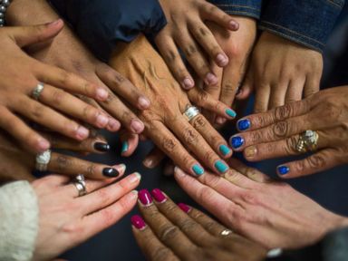 PHOTO: In a show of solidarity, unidentified victim of sex trafficking put their hands together during a meeting at My Life My Choice, an anti-human trafficking agency, Boston, March 24, 2016.