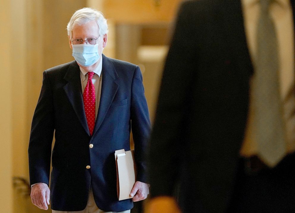 PHOTO: Senate Majority Leader Mitch McConnell walks to the Senate Chamber on Capitol Hill, Dec. 11, 2020.   