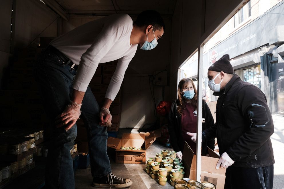 PHOTO: Food is distributed outside of a Brooklyn mosque and cultural center in New York, Dec. 11, 2020.