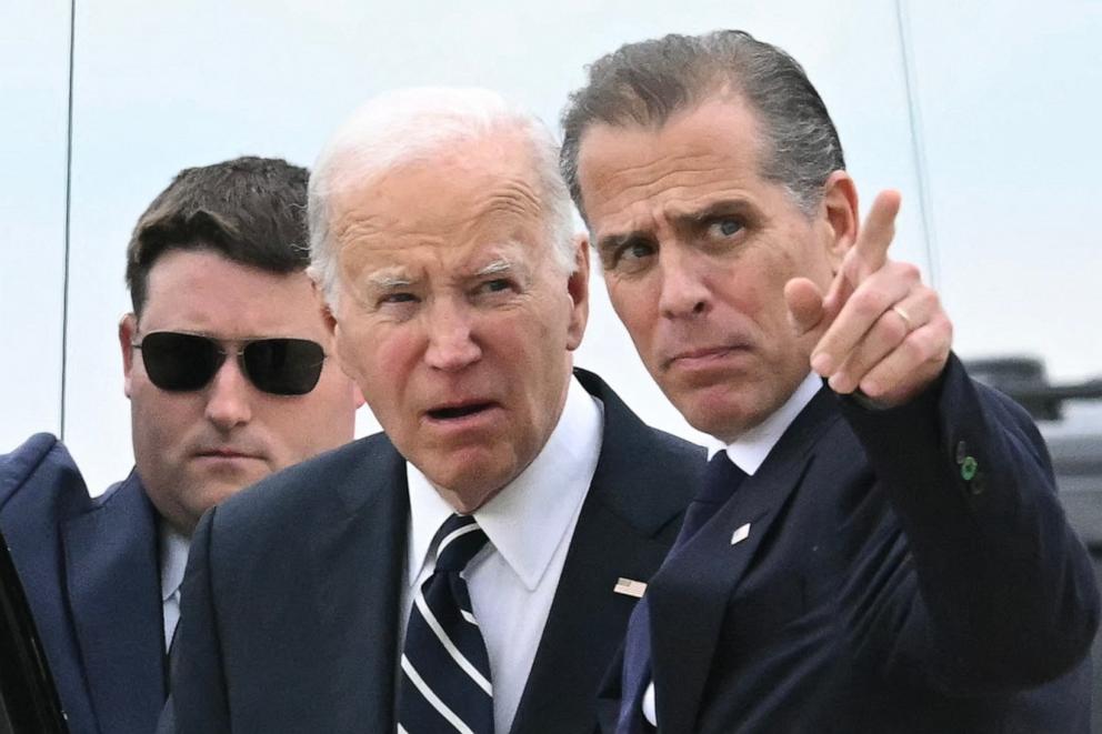 PHOTO: President Joe Biden talks with his son Hunter Biden upon arrival at Delaware Air National Guard Base in New Castle, Delaware, June 11, 2024.