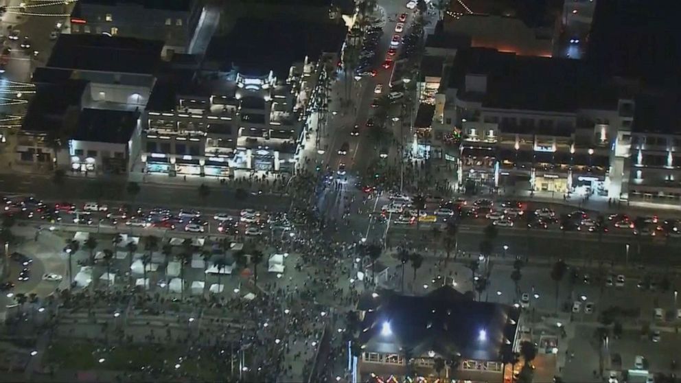 PHOTO: An aerial screenshot provided by FOX 11 KTTV shows throngs of people gathered near the pier in Huntington Beach, California, on May 22, 2021.