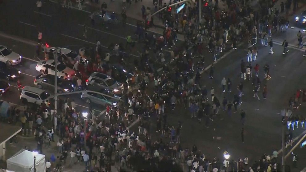 PHOTO: An aerial screenshot provided by FOX 11 KTTV shows throngs of people gathered near the pier in Huntington Beach, California, on May 22, 2021.