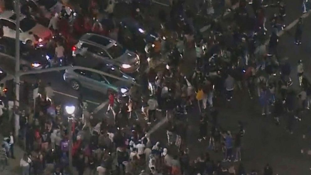 PHOTO: An aerial screenshot provided by FOX 11 KTTV shows throngs of people gathered near the pier in Huntington Beach, California, on May 22, 2021.