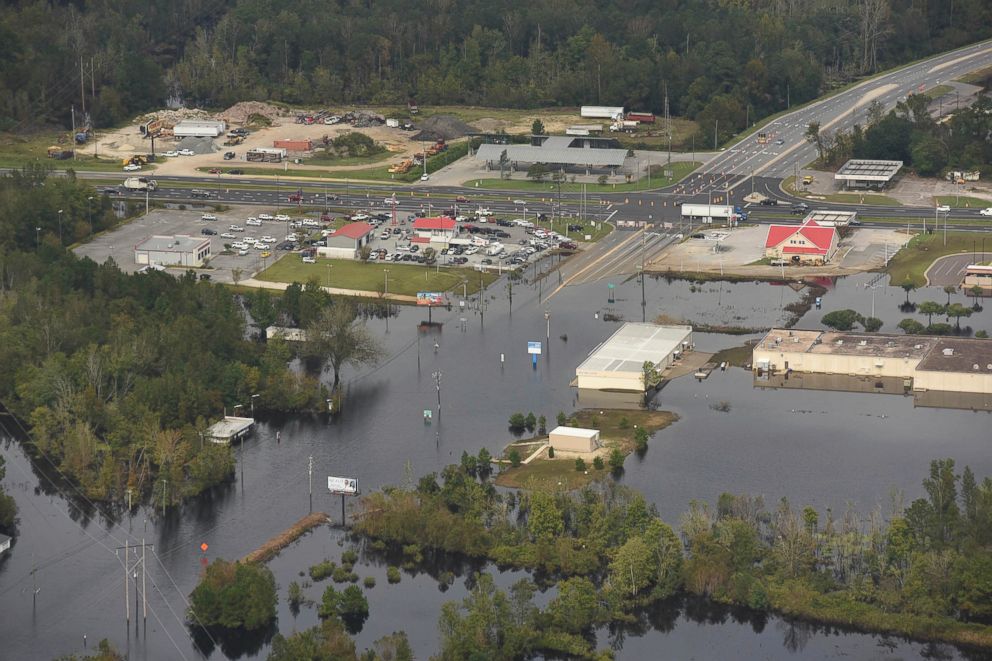 PHOTO: In this Sept. 24, 2018 photo, flood waters from the Neuse River cover the area in Kinston, N.C., a week after Hurricane Florence struck. 