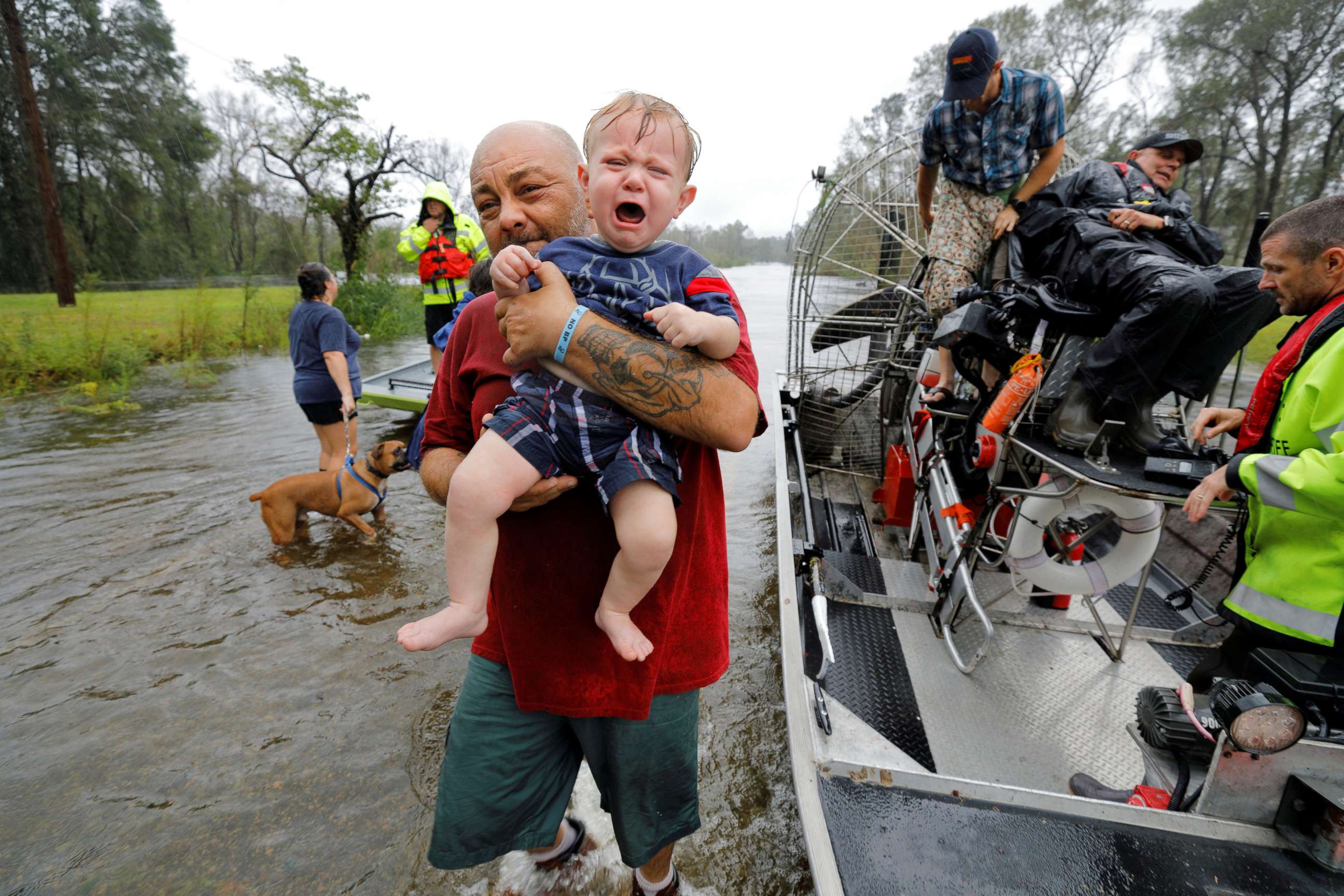 PHOTO: Oliver Kelly, 1, cries as he is carried off the sheriff's airboat during his rescue from rising flood waters in the aftermath of Hurricane Florence in Leland, North Carolina, Sept. 16, 2018.