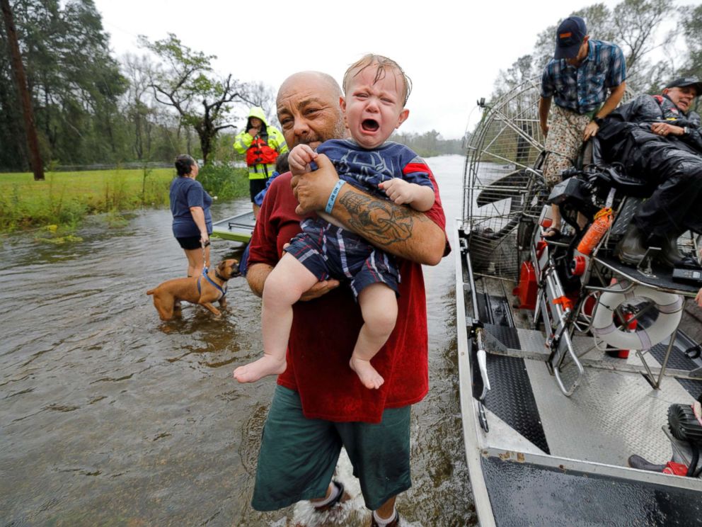 PHOTO: Oliver Kelly, 1, cries as he is carried off the sheriffs airboat during his rescue from rising flood waters in the aftermath of Hurricane Florence in Leland, North Carolina, Sept. 16, 2018.