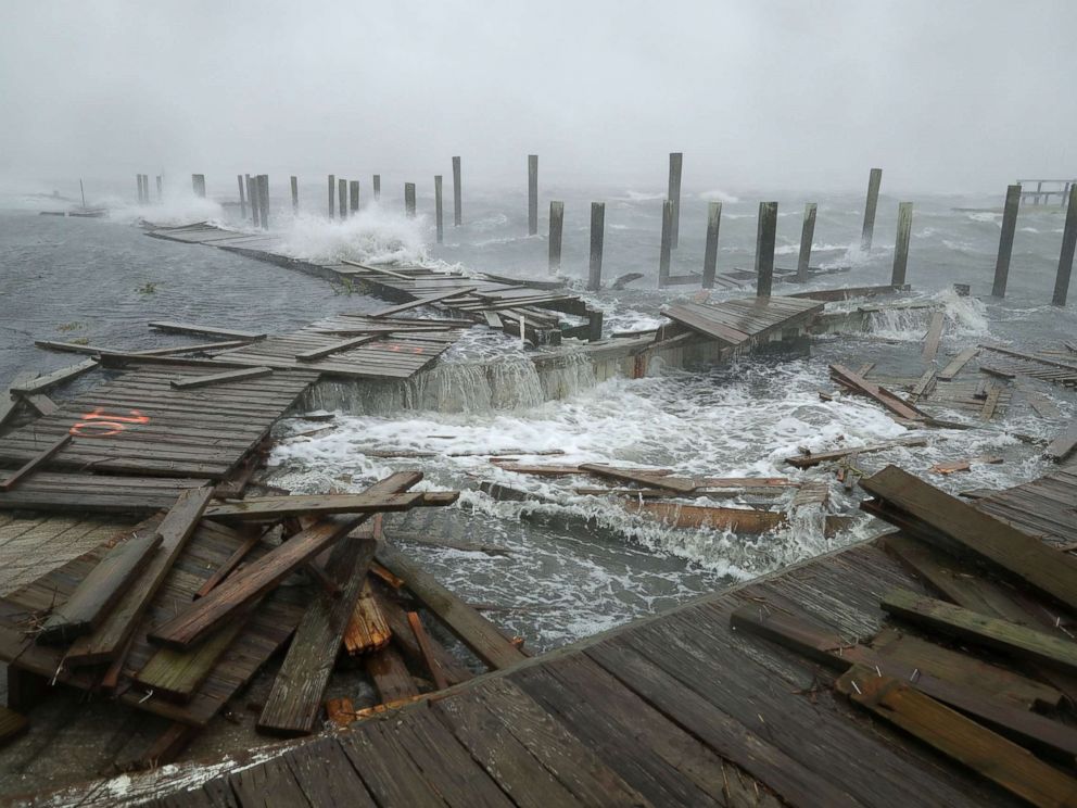PHOTO: Portions of a boat dock and boardwalk are destroyed by powerful wind and waves as Hurricane Florence arrives in Atlantic Beach, N.C., Sept. 13, 2018.