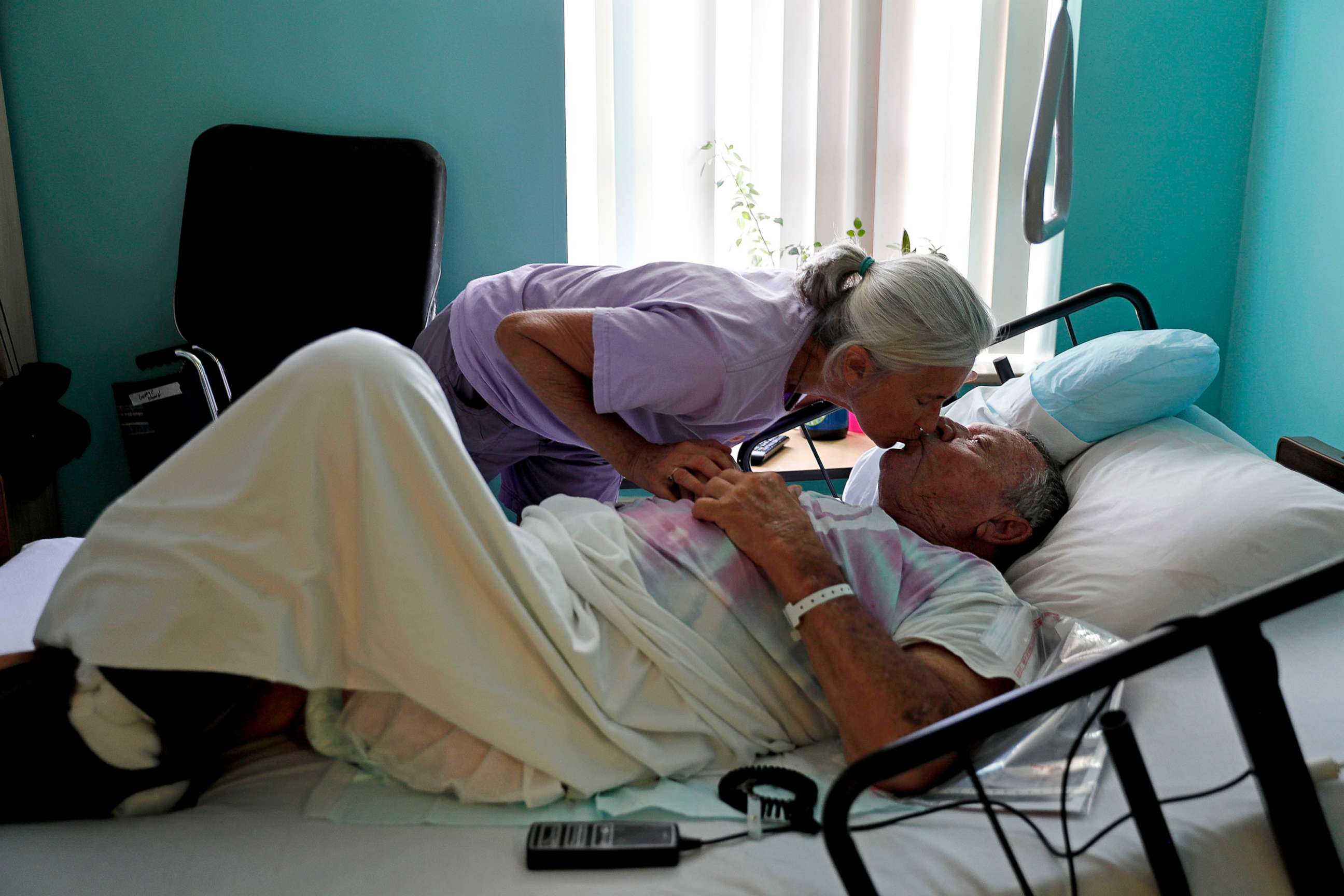 PHOTO: Marge Brown, 65, says goodbye to her father, George Brown, 90, before he is evacuated from a healthcare home in Morehead City, N.C., Sept. 12, 2018, as Hurricane Florence approaches the east coast.