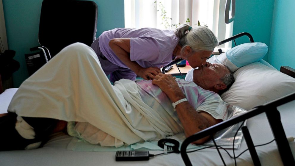 PHOTO: Marge Brown, 65, says goodbye to her father, George Brown, 90, before he is evacuated from a healthcare home in Morehead City, N.C., Sept. 12, 2018, as Hurricane Florence approaches the east coast.