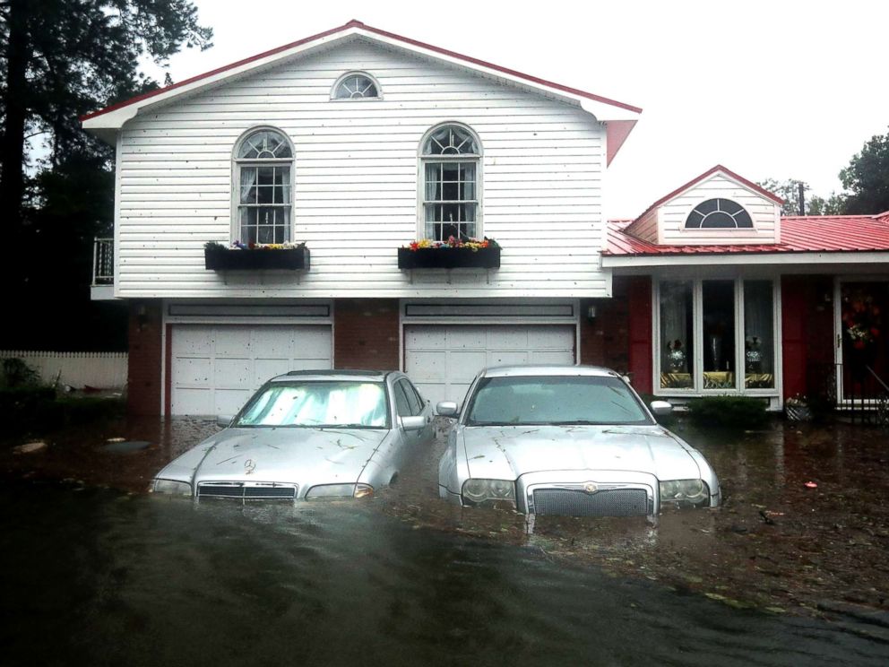 PHOTO: Homes are flooded after a storm surge from Hurricane Florence flooded the Neuse River on Sept. 14, 2018, in New Bern, N.C.