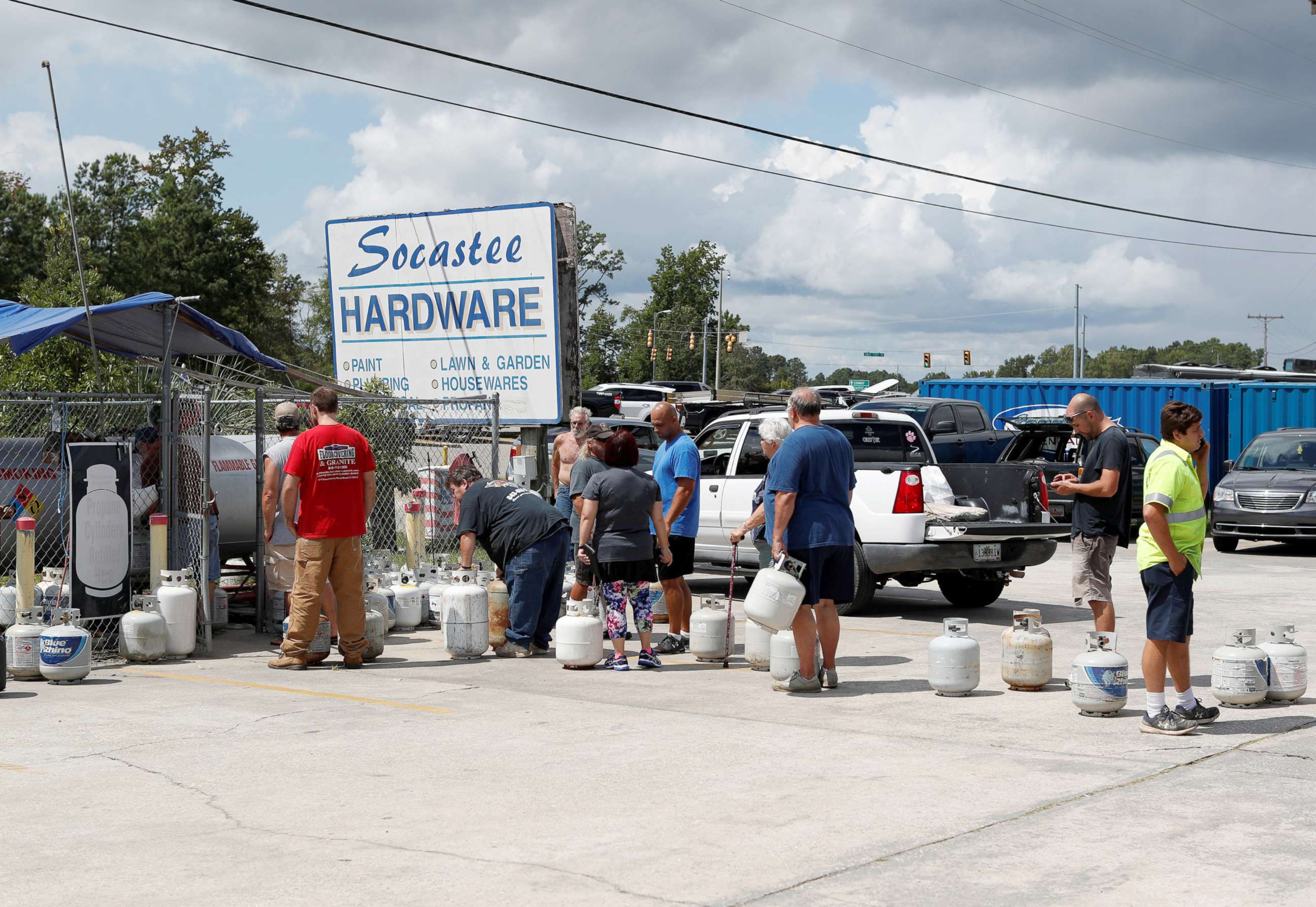 PHOTO: Customers line up to buy propane at Socastee Hardware store, ahead of the arrival of Hurricane Florence in Myrtle Beach, South Carolina, Sept. 10, 2018.