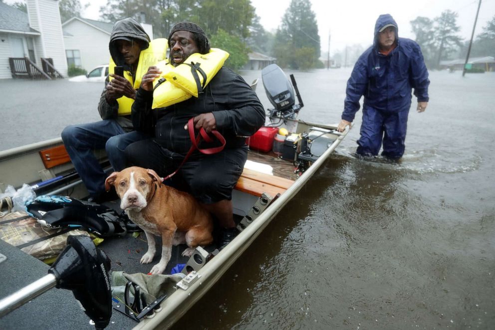 Volunteers from all over North Carolina help rescue residents and their pets from their flooded homes during Hurricane Florence, Sept. 14, 2018 in New Bern, N.C. 