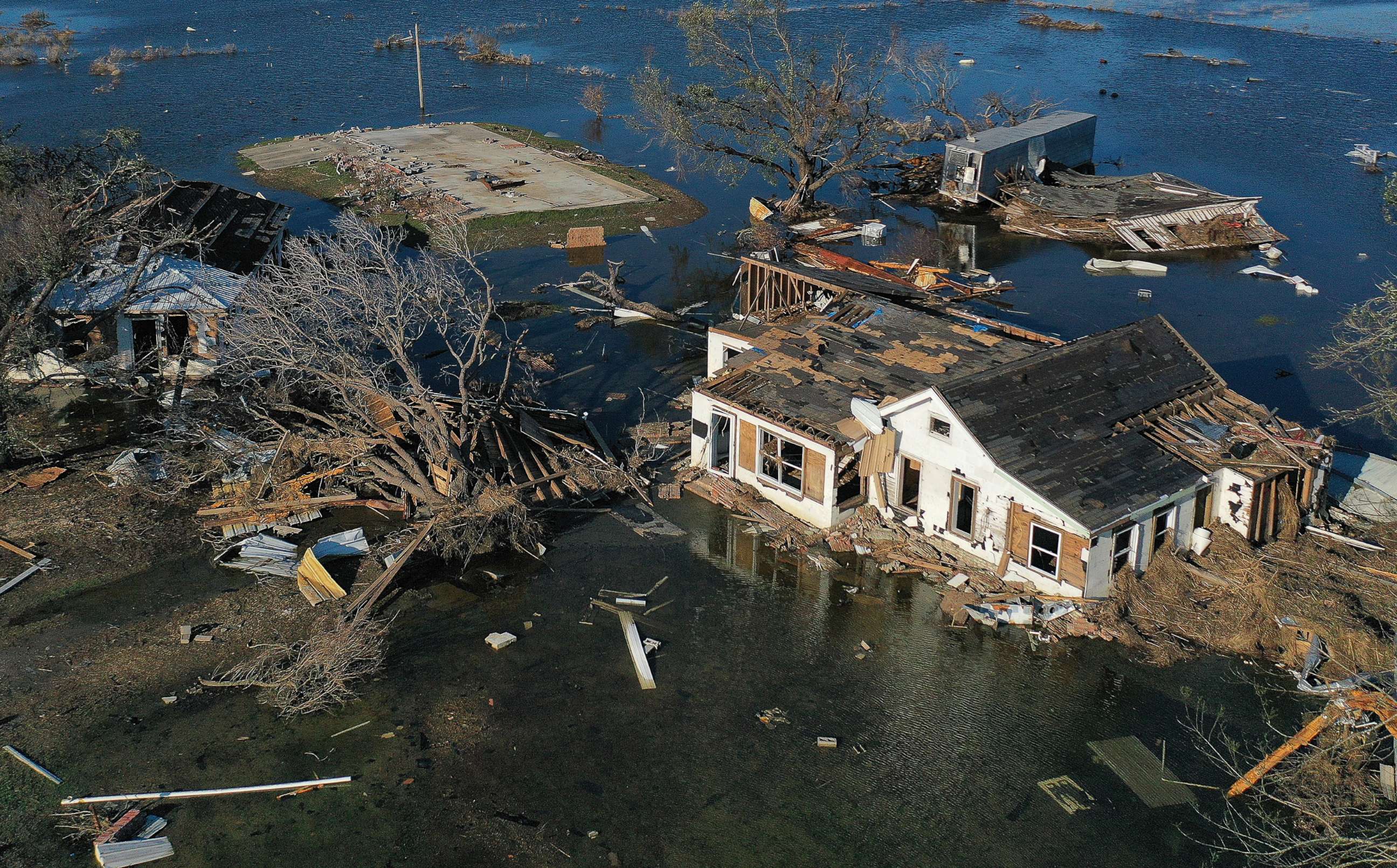 PHOTO: An aerial view of flood waters from Hurricane Delta surrounding structures destroyed by Hurricane Laura on Oct. 10, 2020, in Creole, Louisiana.