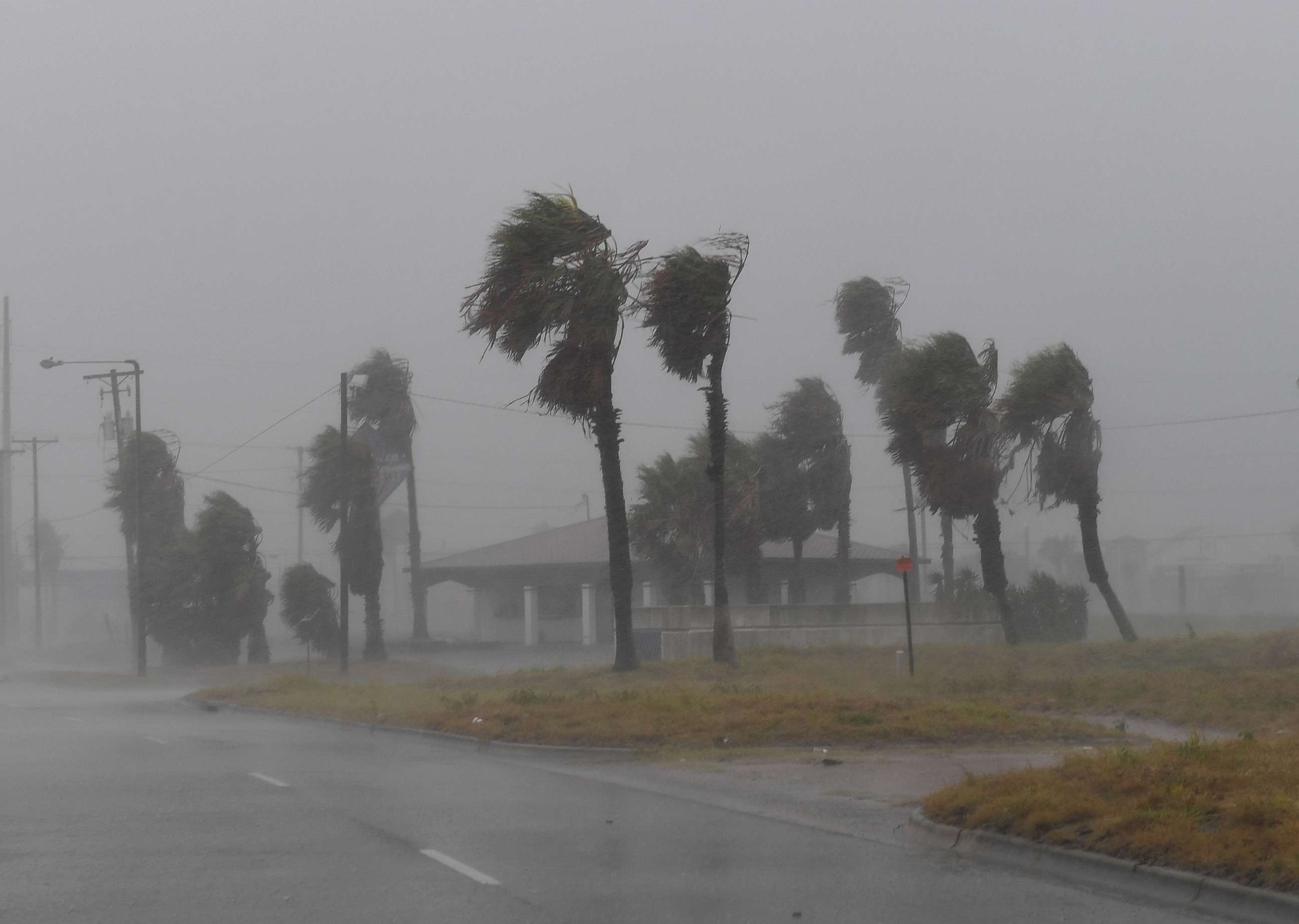 PHOTO: Strong winds batter a house on Padre Island before the approaching Hurricane Harvey in Corpus Christi, Texas on Aug. 25, 2017.