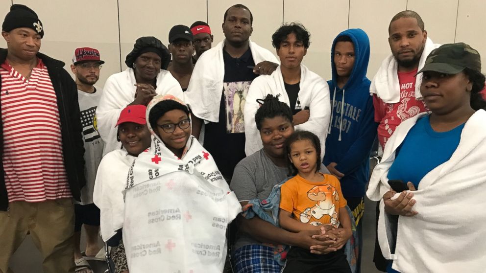 PHOTO: Iashia Nelson and her son are photographed here with other storm victims in Houston, Texas.