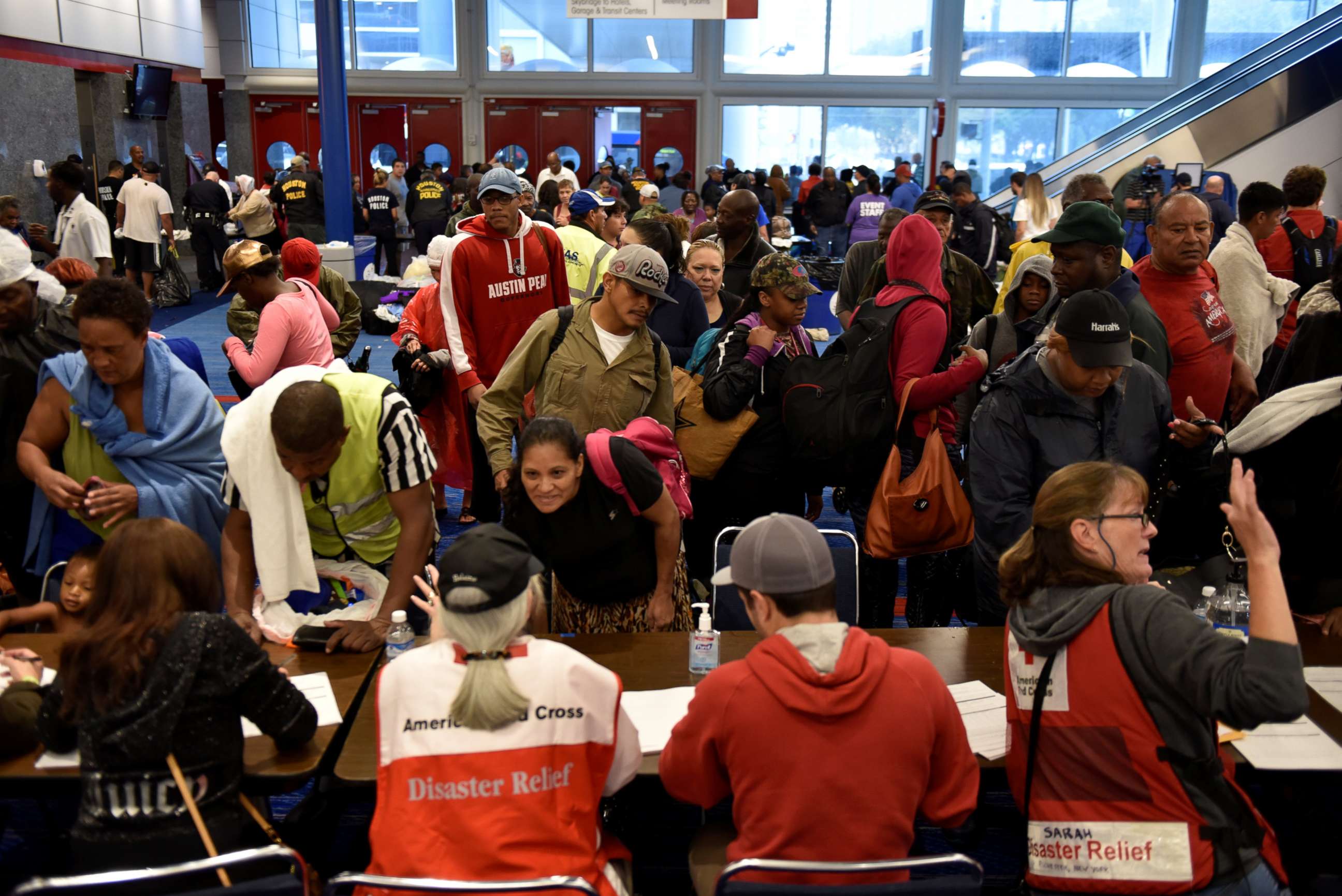 PHOTO: Volunteers with The American Red Cross register evacuees at the George R. Brown Convention Center after Hurricane Harvey inundated the Texas Gulf coast with rain causing widespread flooding, in Houston, Aug. 28, 2017.