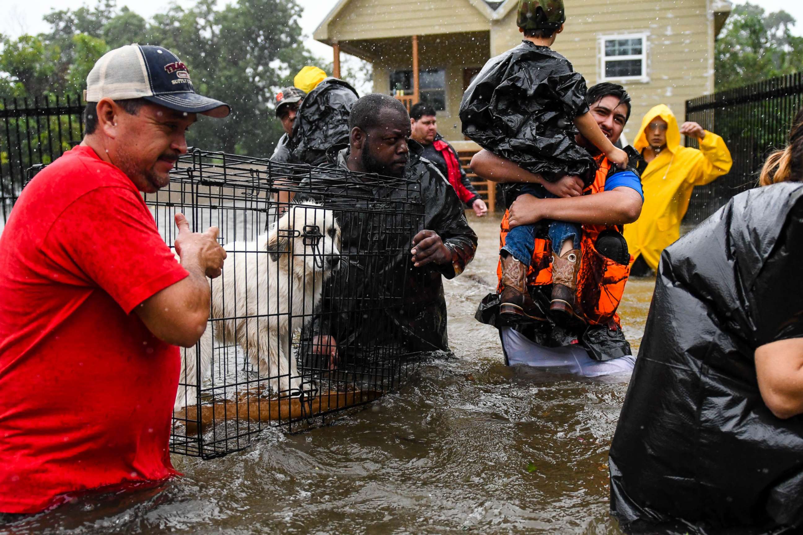 PHOTO: Volunteers and First Responders help flood victims evacuate to shelters in Houston, Aug. 28, 2017. 