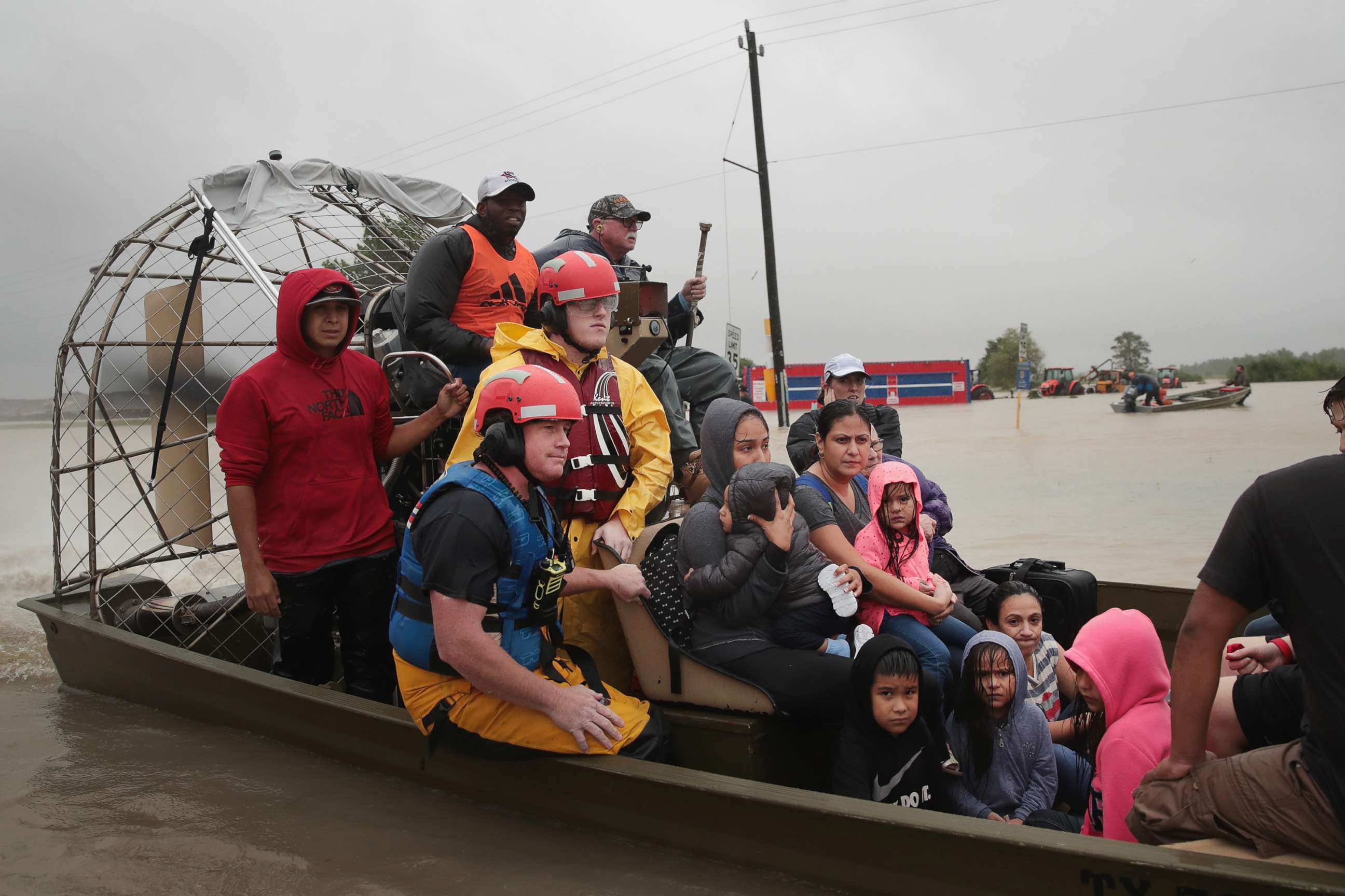 PHOTO: People are rescued from a flooded neighborhood after it was inundated with rain water, remnants of Hurricane Harvey, Aug. 28, 2017, in Houston. 