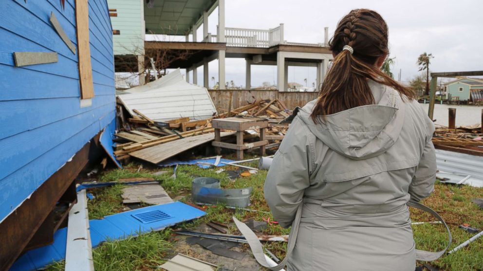 PHOTO: Christina and Jared Jellison assess damage to their vacation home caused by Hurricane Harvey in Rockport, Texas on Aug. 28, 2017.