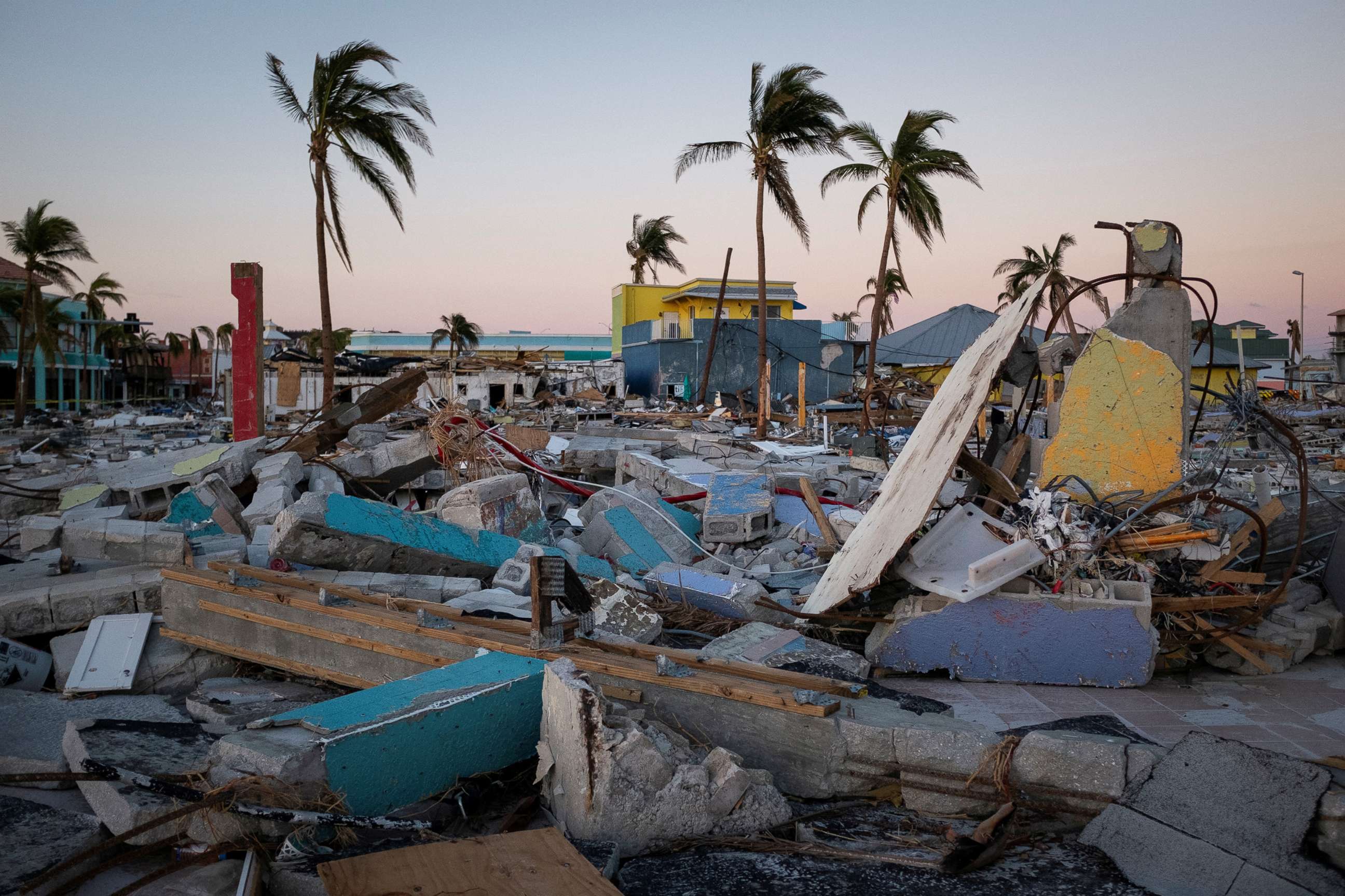 PHOTO: Remains of destroyed restaurants, shops and other businesses are seen after Hurricane Ian caused widespread destruction in Fort Myers Beach, Fla., Oct. 4, 2022. 