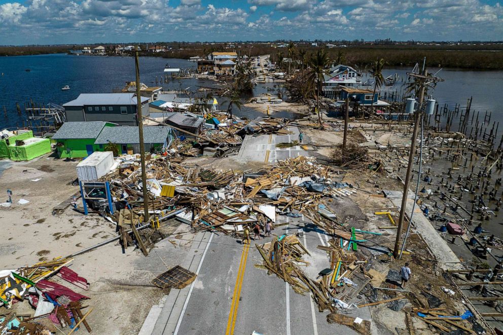 PHOTO: An aerial view shows a broken section of the Pine Island Road, debris and destroyed houses in the aftermath of Hurricane Ian in Matlacha, Fla., Oct. 1, 2022. 