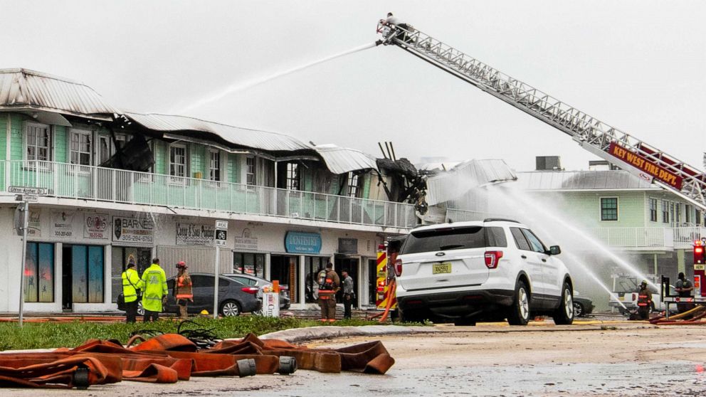 PHOTO: Key West Fire Department works on a strip mall fire on Flagler Ave., in midtown Key West, Fla., in the aftermath of Hurricane Ian's tropical winds, Sept. 28, 2022.