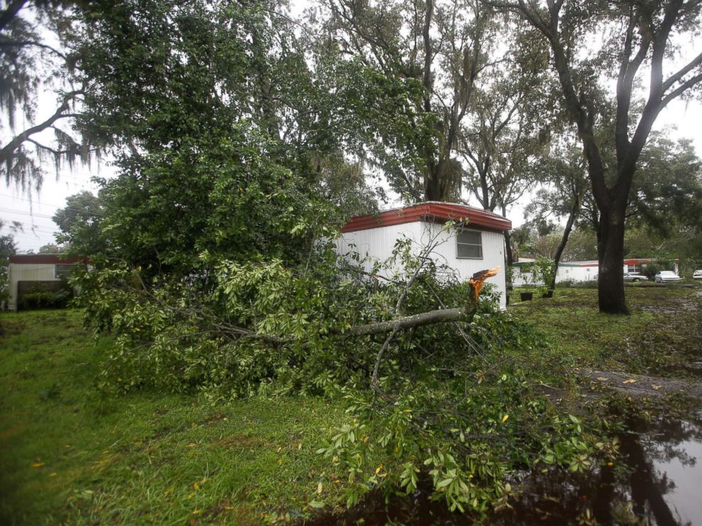 PHOTO: A fallen branch lays beside a mobile home after Hurricane Irma made landfall in Tampa, Fla., Sept. 11, 2017.