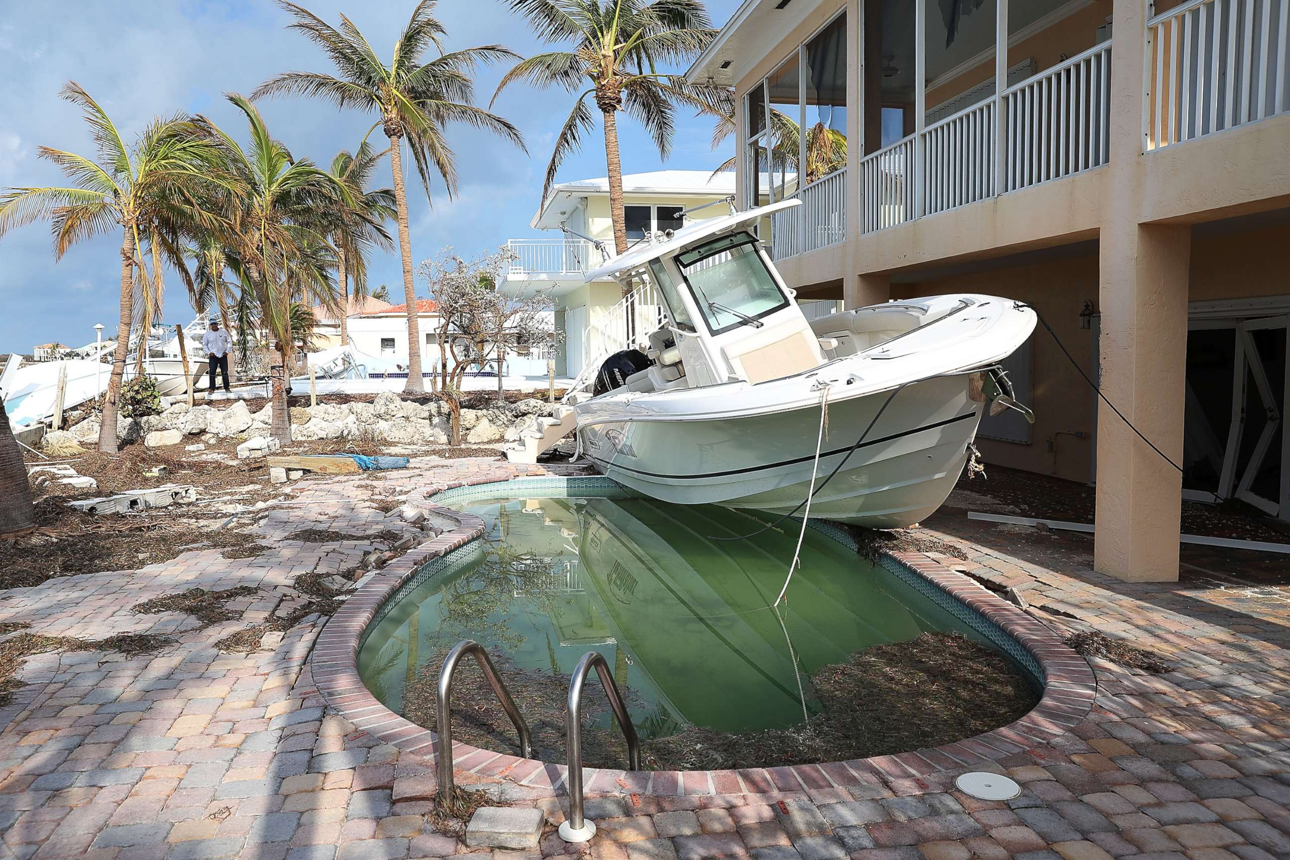 PHOTO: A boat is seen next to a home after Hurricane Irma passed through the area, Sept. 13, 2017, in Duck Key, Florida.