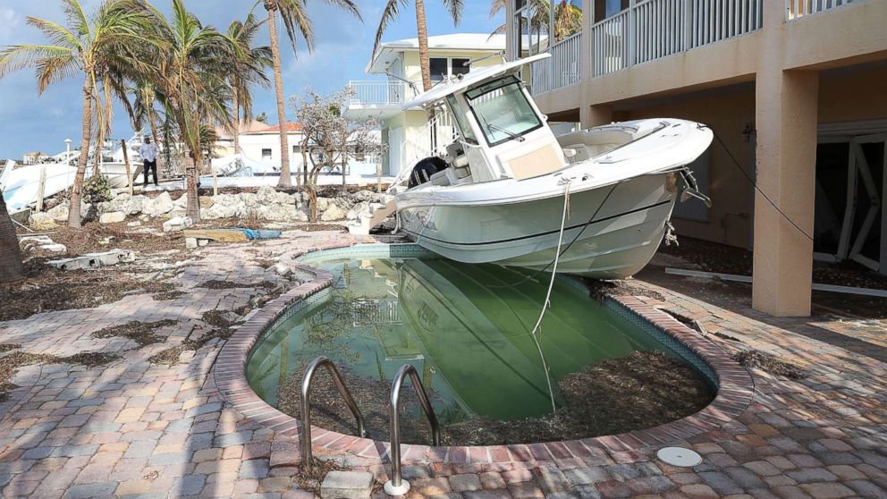 PHOTO: A boat is seen next to a home after Hurricane Irma passed through the area, Sept. 13, 2017, in Duck Key, Florida.