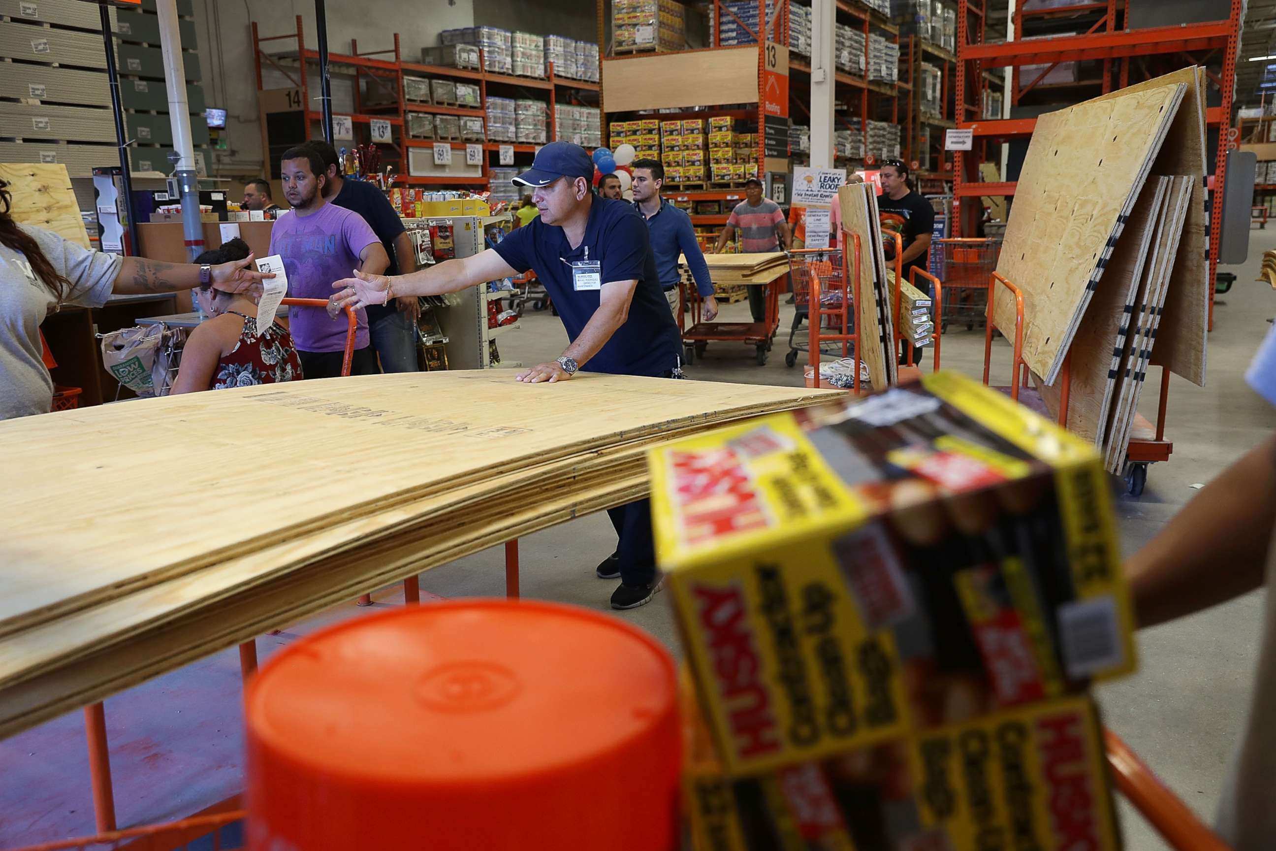 PHOTO: People purchase plywood at The Home Depot as they prepare for Hurricane Irma, Sept. 6, 2017, in Miami. 