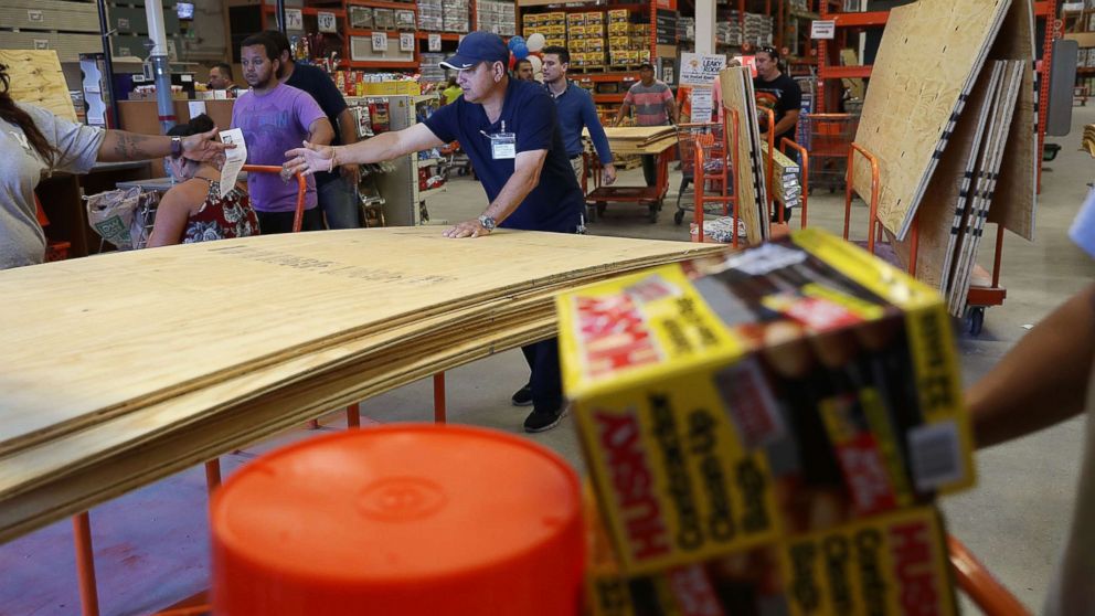 PHOTO: People purchase plywood at The Home Depot as they prepare for Hurricane Irma, Sept. 6, 2017, in Miami. 