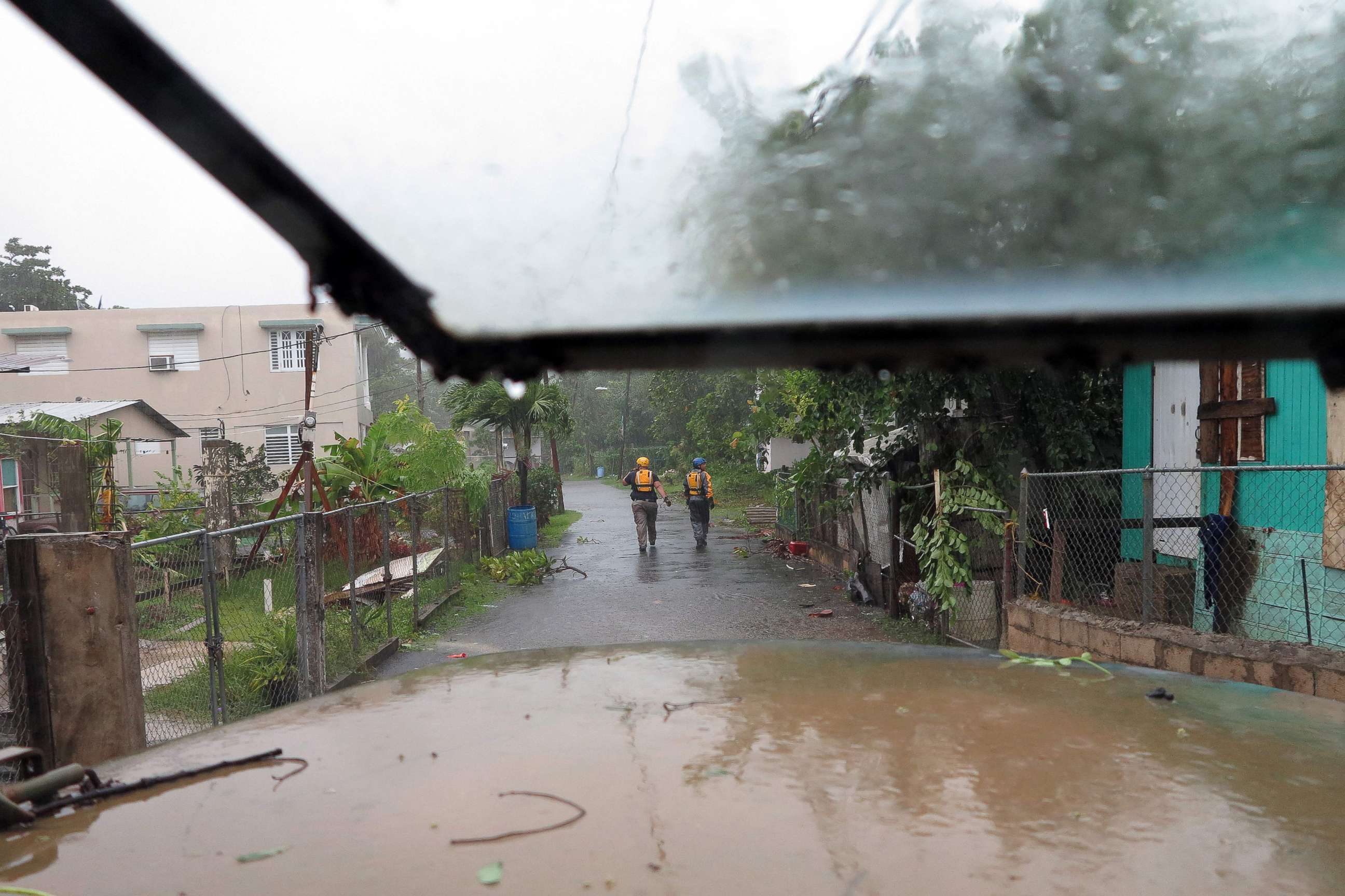 PHOTO: Search and rescue crew members walk a street during a search mission as hurricane Irma hits Puerto Rico in Fajardo, Sept. 6,2017.