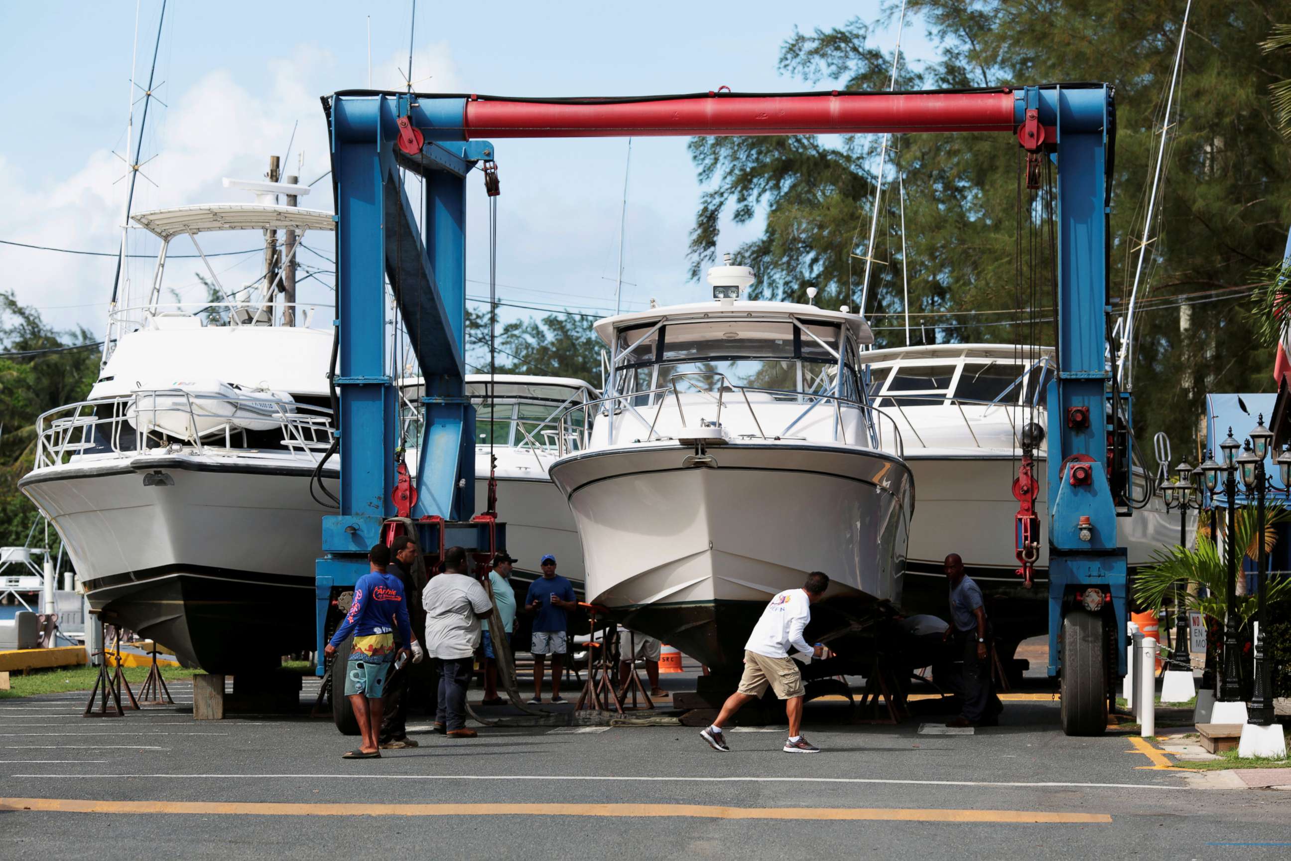 PHOTO: Workers put boats on dry docks in preparation, as Hurricane Irma, barreling towards the Caribbean and the southern United States, was upgraded to a Category 4 storm, in San Juan, Puerto Rico, Sept. 4, 2017.