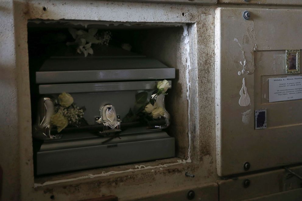 PHOTO: The casket of Victor Ruiz Ramos is entered into a mausoleum during his funeral service in Corozal, Puerto Rico, Oct. 2, 2017.