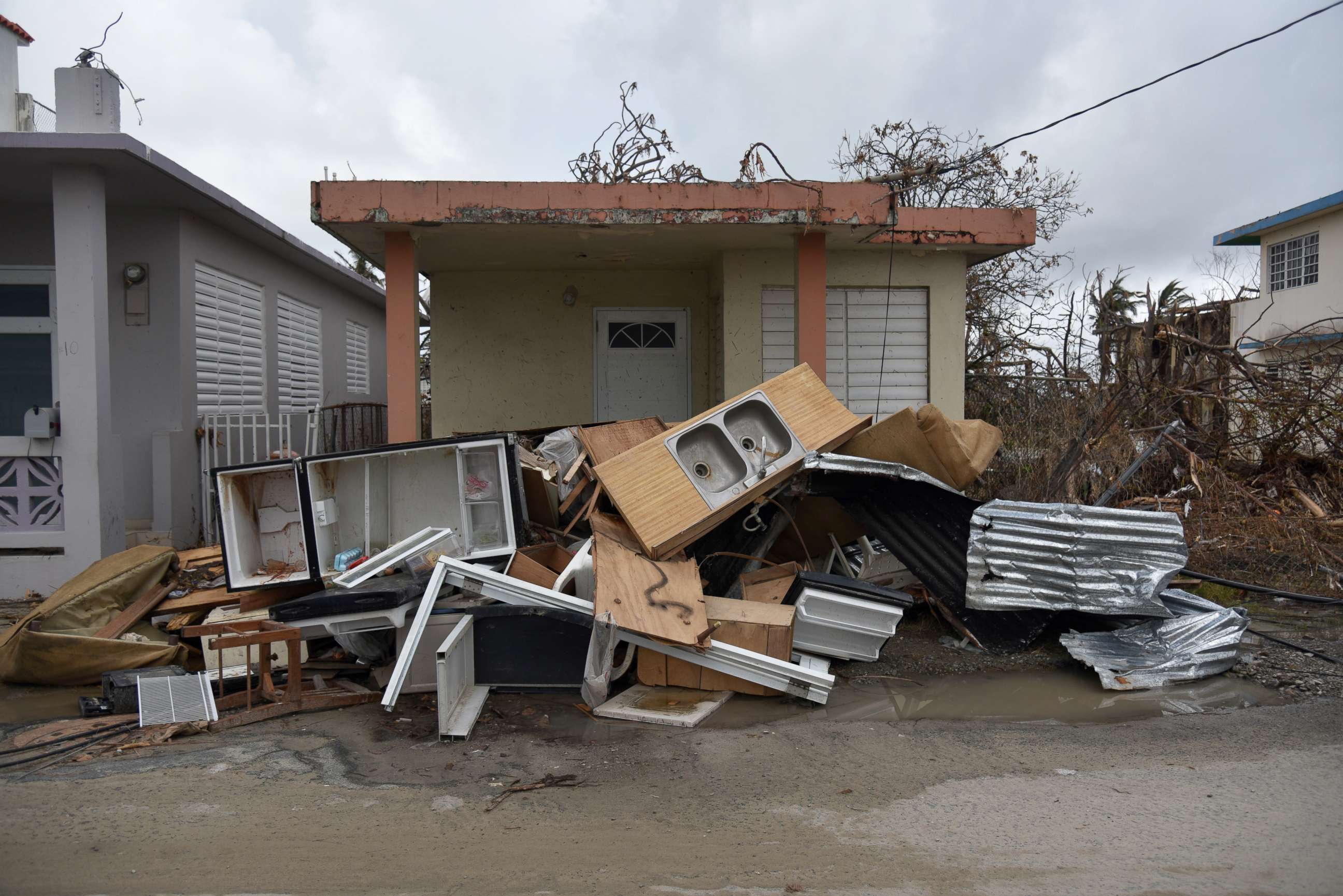 PHOTO: Damaged furniture is seen in front of a house in Punta Santiago, Humacao, Puerto Rico, Sept. 27, 2017, one week after the passage of Hurricane Maria.
