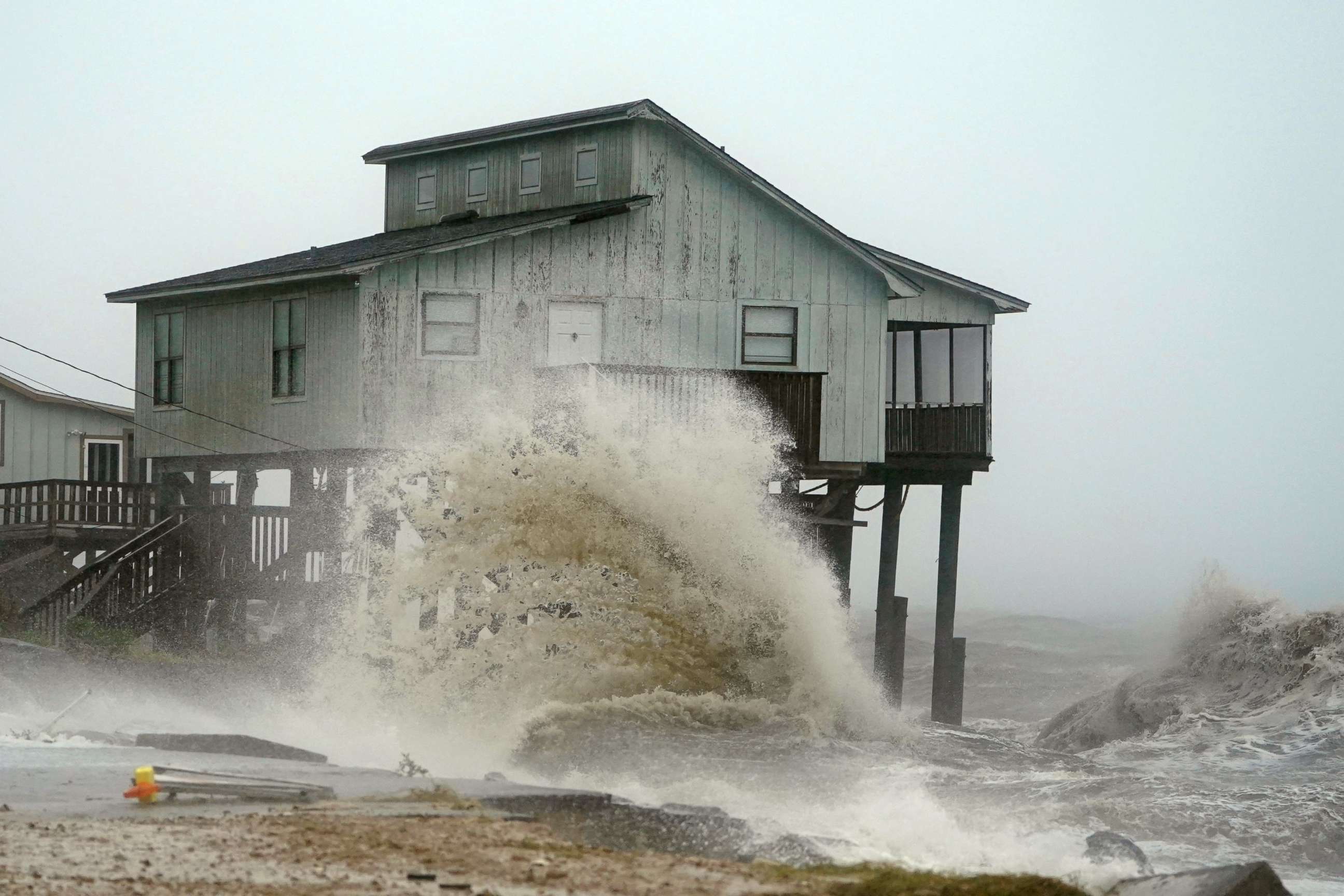 PHOTO: Waves take over a house as Hurricane Michael comes ashore in Alligator Point, Fla., Oct. 10, 2018. 