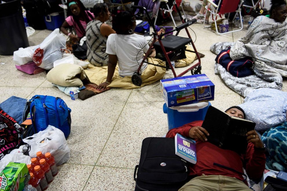 PHOTO: People seek safety in a shelter as Hurricane Michael approaches, Oct. 10, 2018, in Panama City, Fla.