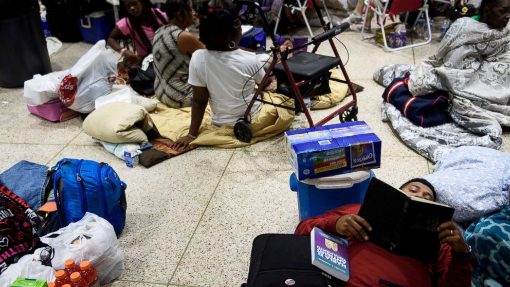 PHOTO: People seek safety in a shelter as Hurricane Michael approaches, Oct. 10, 2018, in Panama City, Fla.