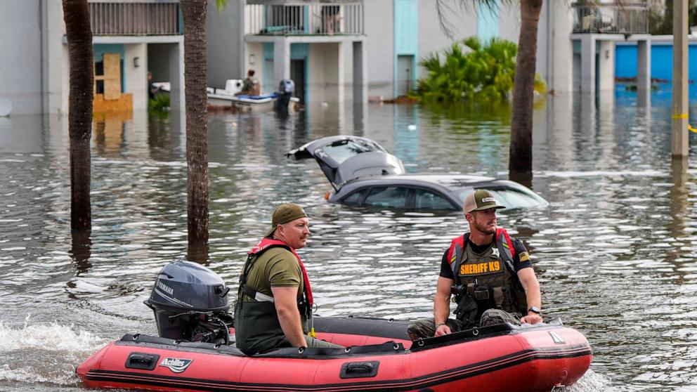 PHOTO: A water rescue boat moves in flood waters at an apartment complex in the aftermath of Hurricane Milton, Oct. 10, 2024, in Clearwater, Fla.