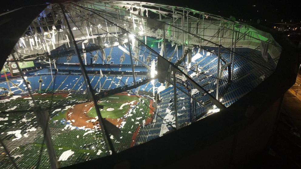 PHOTO: A drone image above Tropicana Field, home of the Tampa Bay Rays, show the shredded roof of the dome and the cots on the field, set up for first responders, among the debris, Oct. 10, 2024.