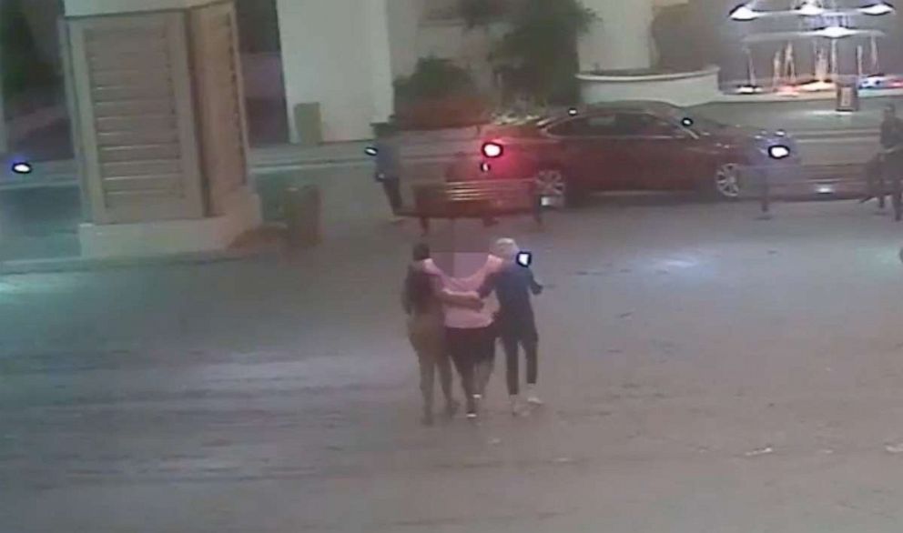 PHOTO: Surveillance video shows the women escorting the victim to a vehicle outside the casino. 