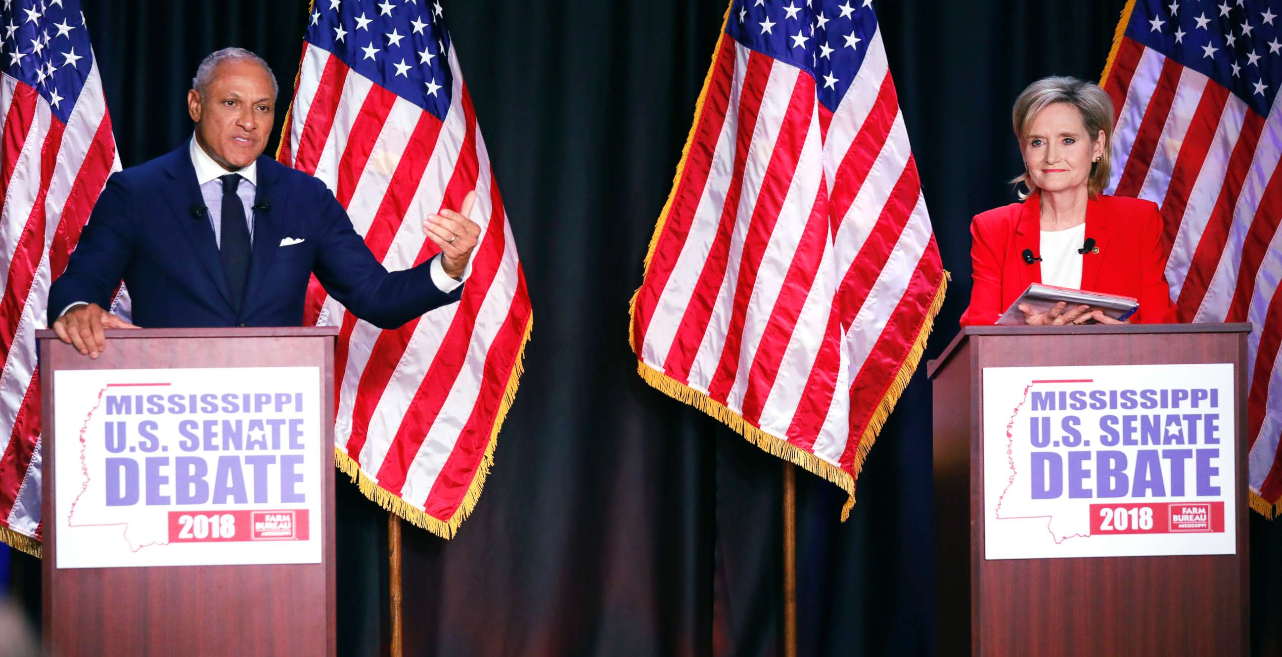 PHOTO: Democrat Mike Espy, left, challenges an answer from appointed U.S. Sen. Cindy Hyde-Smith, R-Miss., during their televised Mississippi U.S. Senate debate in Jackson, Miss., Nov. 20, 2018. 