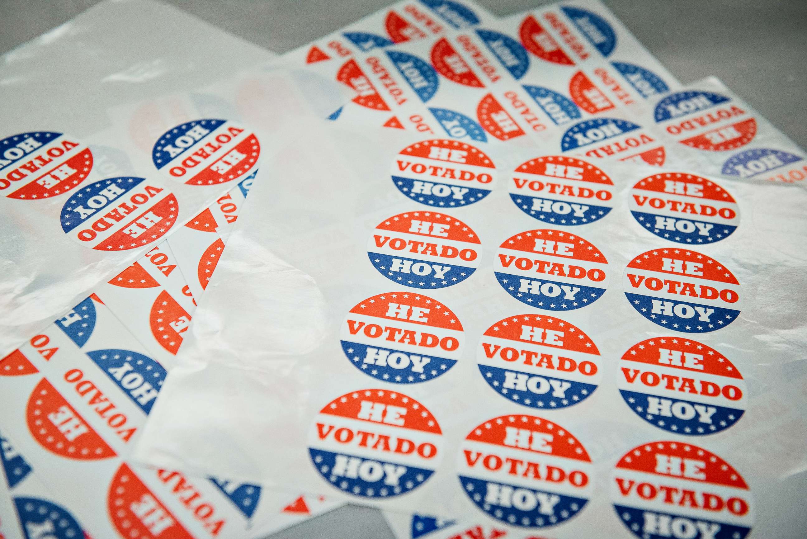 PHOTO: Sheets of stickers reading "I Voted Today" in Spanish are displayed on a table at a polling station inside a Baptist Church in Philadelphia, Penn., June 2, 2020.