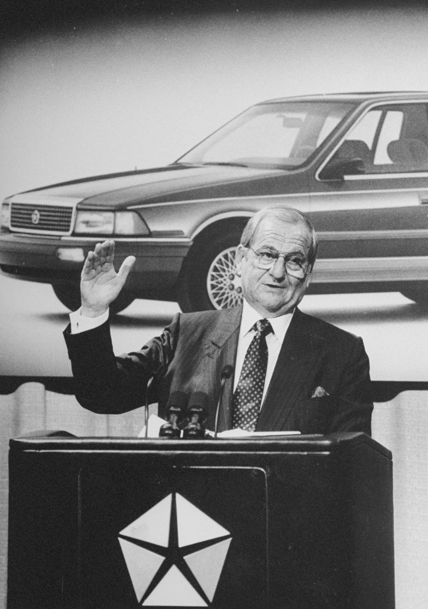 PHOTO: Lee Iacocca announces Chrysler sales figures for 1988.