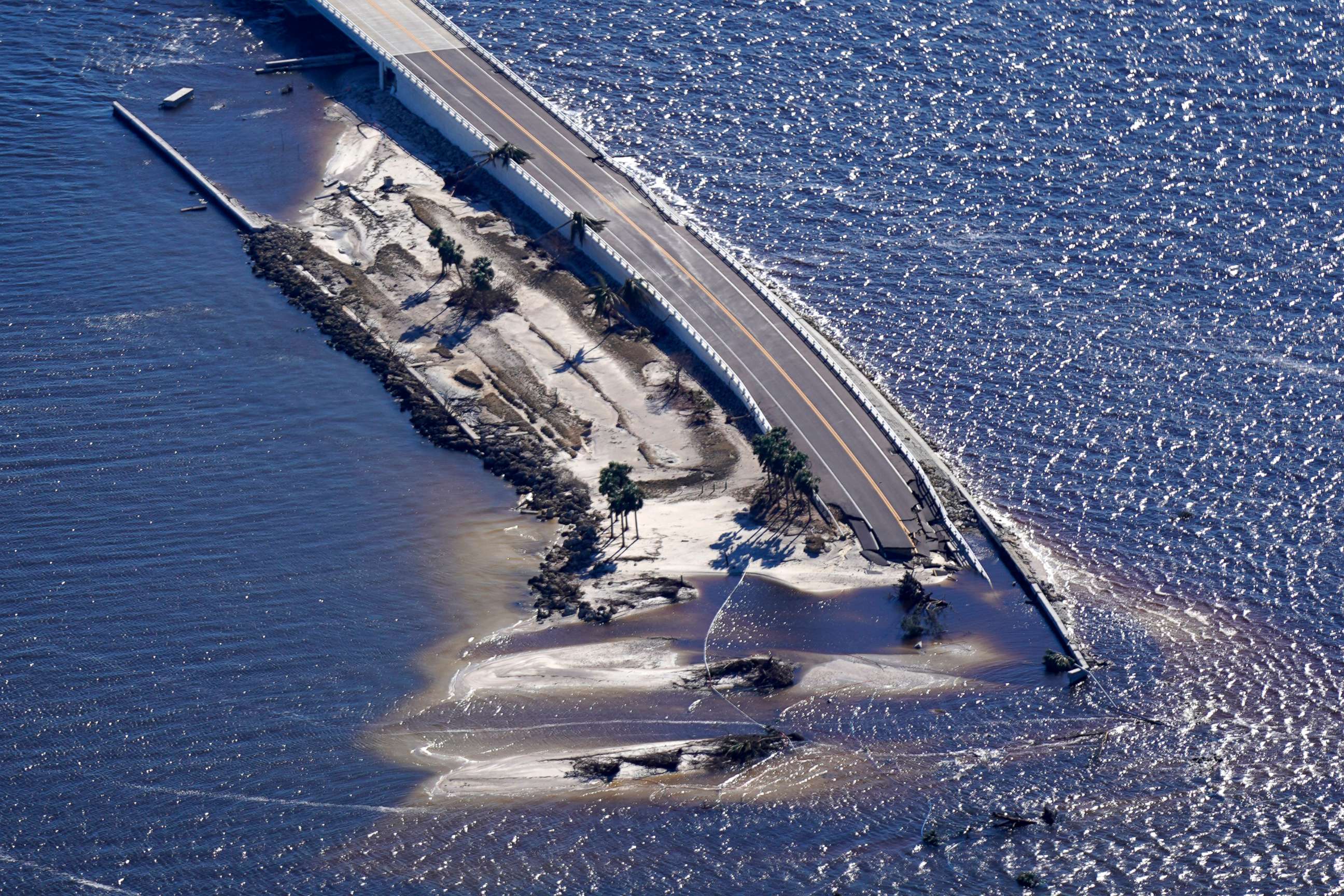 PHOTO: Damage from Hurricane Ian is seen on the causeway leading to Sanibel Island from Fort Myers, Fla., in this aerial photo made in a flight provided by mediccorps.org, on Sept. 30, 2022.
