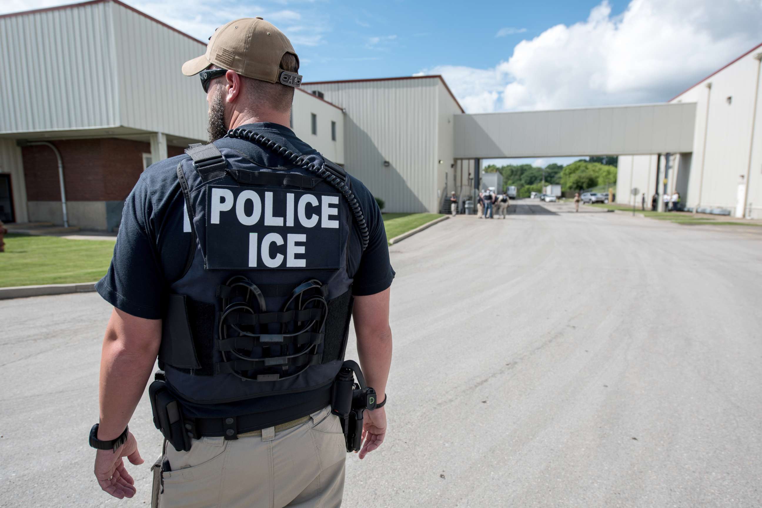 PHOTO: US Immigration and Customs Enforcement's (ICE) special agent prepare to arrest alleged immigration violators at Fresh Mark, Salem, June 19, 2018.