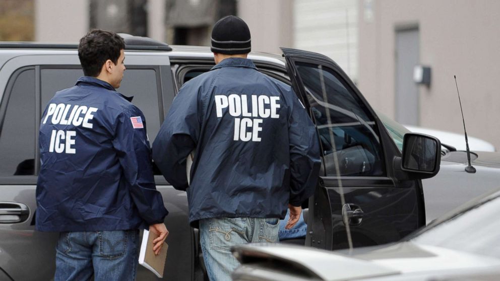 PHOTO: U.S. Immigration and Customs Enforcement agents leave the Yamato Engine Specialist plant in Bellingham, Washington, after raiding the plant for illegal immigrants, Feb. 24, 2009.