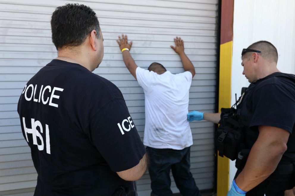 PHOTO: U.S. Immigration and Customs Enforcement's Homeland Security Investigations officers arrest more than 100 company employees on federal immigration violations at a trailer manufacturing business in Sumner, Texas, Aug. 28, 2018.