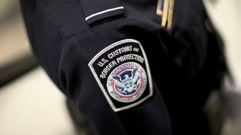 An officer is pictured in his U.S. Customs and Border Protection uniform. 